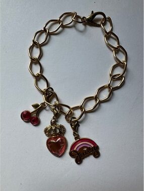 Juicy couture chain bracelet with cherrie rainbow and heart with crown charms